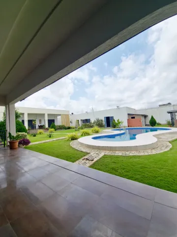 MAGNIFIQUE RÉSIDENCE AVEC PISCINE+JARDIN bâtie sur 3,25 lots a Agoe legbassito